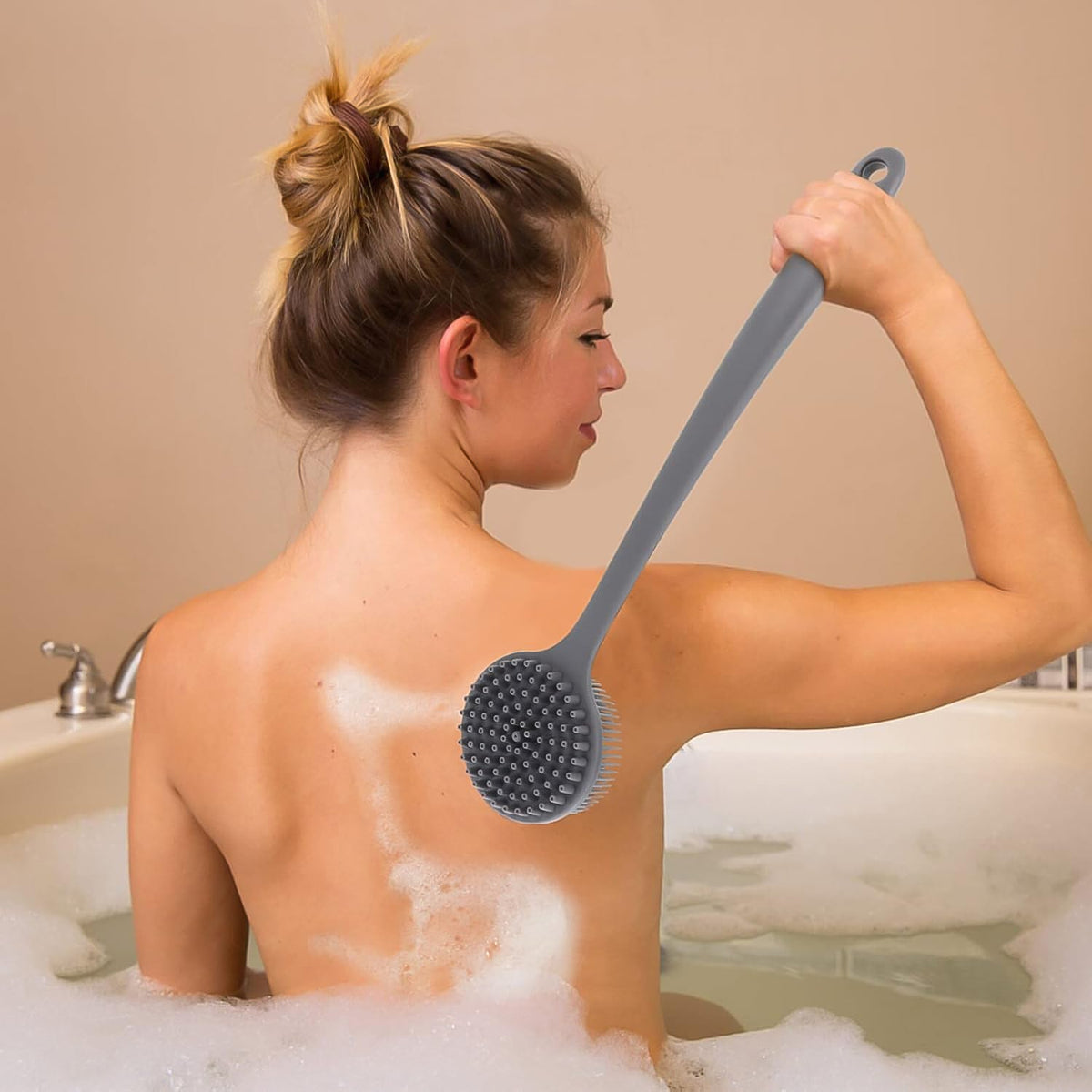Flexible reach of the silicone back scrubber brush